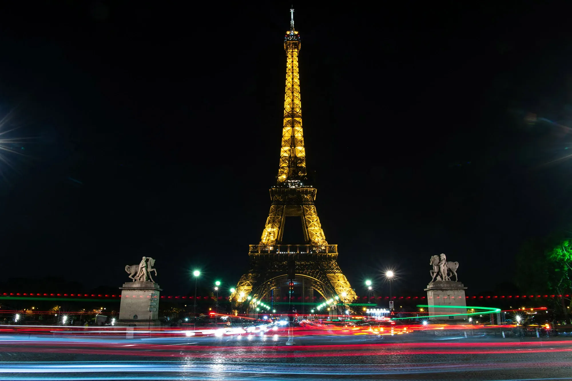 Eiffel Tower at Night: Lights, Spectacle, and Parisian Magic